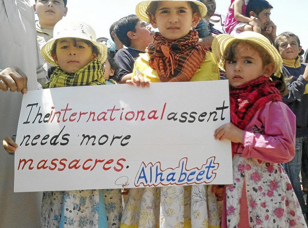 Demonstrators protest against Syria's President Bashar al-Assad in Habeet